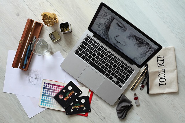 editor updating practical travel checklist on laptop